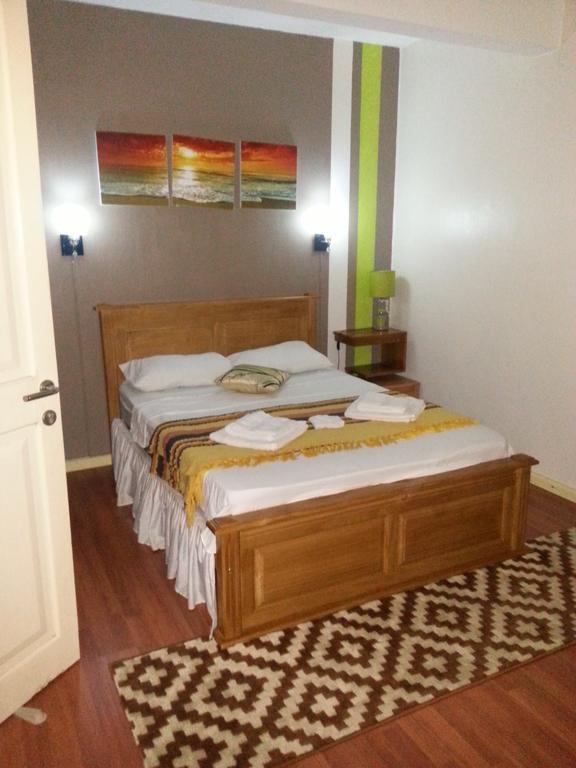 Krishangel Beach Apartment Flic en Flac Room photo